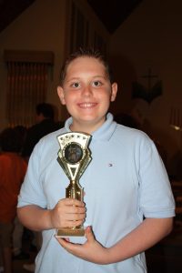 Boy with Piano trophy